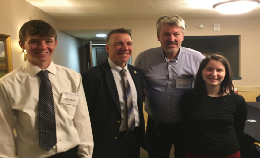 From left to right: Mercury Editor-In-Chief, Vermont Governor Phil Scott, Mercury advisor Peter Riegelman and Mercury reporter Ambyr Wagner pose for a picture after the monumental signing of bill H. 513.