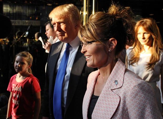 FILE - In this May 31, 2011 file photo, Donald Trump walks with former governor of Alaska Sarah Palin in New York City. The Republican presidential front-runner Trump received a key endorsement from conservative heavyweight Sarah Palin, Tuesday, Jan. 19, 2016.   (AP Photo/Craig Ruttle, File)