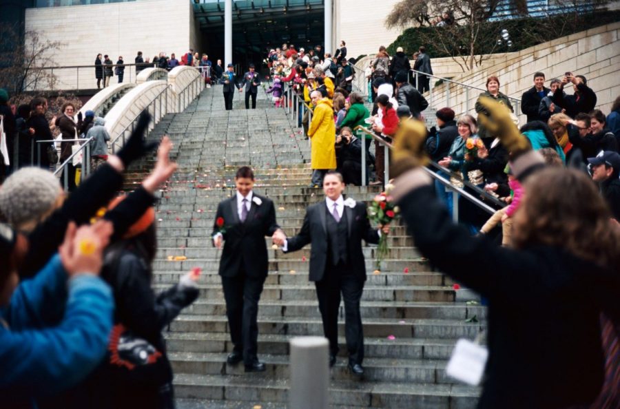 Photo credit: https://commons.wikimedia.org/wiki/File:Leaving_Seattle_City_Hall_on_first_day_of_gay_marriage_in_Washington_2.jpg
