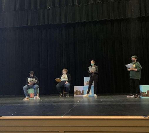 BFA actors rehearsing on stage.
Pictured from left to right: Aiden Parah (‘24), Emily Parent (‘22), Madison Gagner (‘23), Katie Galuszka (‘23)
Photo credit:  Yuki Benjamin 
