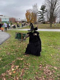 Rebecca Chomyn acts as the Wicked Witch in the Town of Fairfields Halloween walk, which had a Wizard of Oz theme.