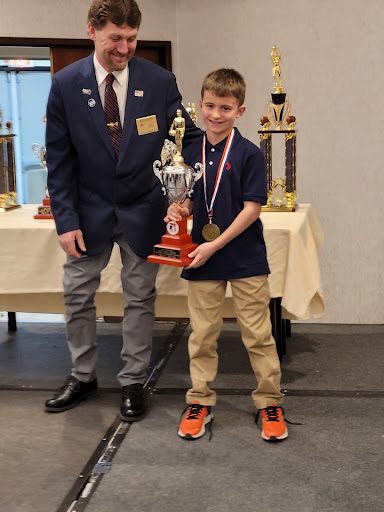 Jackson receiving his regional championship trophy Photo credit: Roy Sargent
