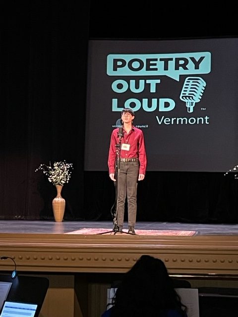 Elio Haag (22) performs at the Poetry Out Loud Vermont state competition. Photo credit: Larissa Hebert