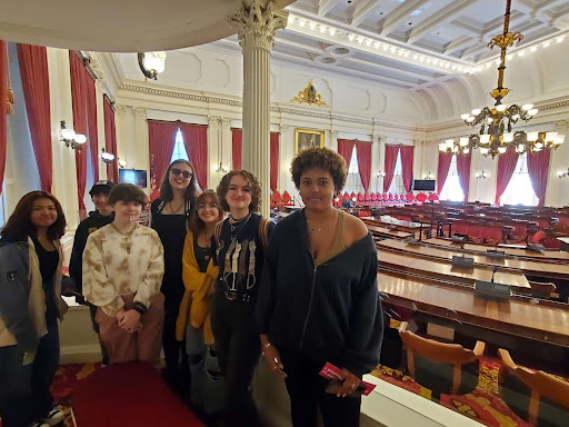 BFA Social Justice Club members inside the chamber of the Vermont State House:  Patricia Noza (26), Paxton Getty (24), Cloudy Hadd (25), Rachel Ledoux (24), Leeza Kusmit (24), Reilly Babinski (23) and Mikayla Lewis (24).
Photo credit: Nicole Schubert