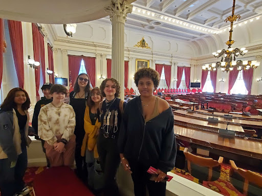 BFA Social Justice Club members inside the chamber of the Vermont State House:  Patricia Noza ('26), Paxton Getty ('24), Cloudy Hadd ('25), Rachel Ledoux ('24), Leeza Kusmit ('24), Reilly Babinski ('23) and Mikayla Lewis ('24).
Photo credit: Nicole Schubert