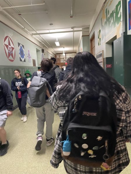 Students walking in the BFA hallways.